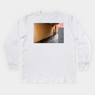 in a narrow alley you see a bike Kids Long Sleeve T-Shirt